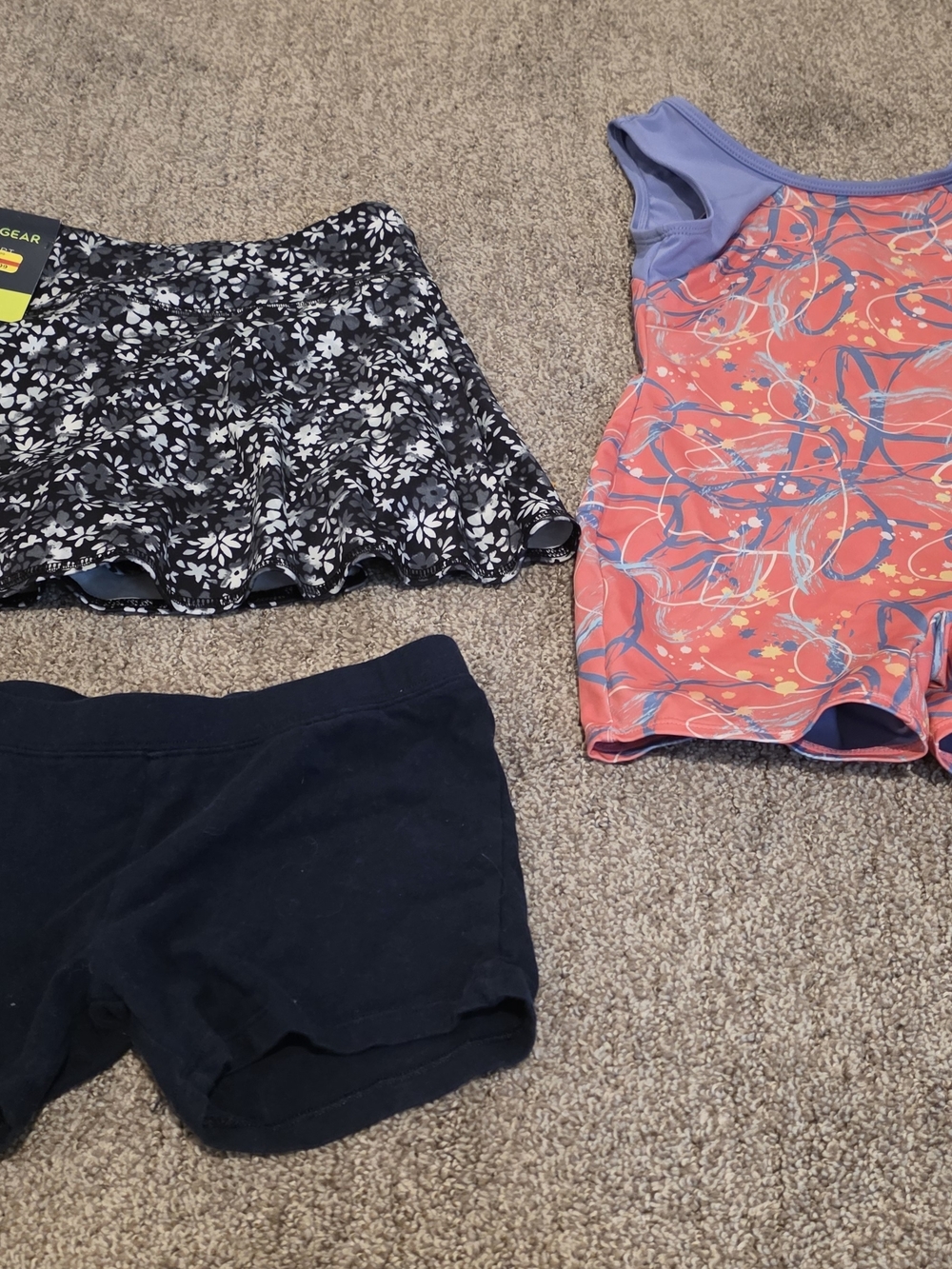 tek gear Coral and Purple Active Romper with Black Floral Skort and Navy Shorts
